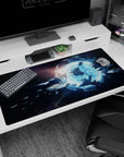Glowing blue gateway scene desk pad 40x20 inches with star-dusted void and tiny ships drifting.
