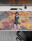 Cozy pastel anime desk pad 40x20 inches in peach, gold, and sky-blue tones for calm gaming.
