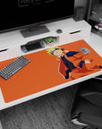 Naruto Uzumaki relaxing with a cool grin on an anime desk pad 40x20 inches, orange jacket pop.