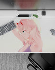 40x20 inches mouse pad showcasing Zero Two, with a golden glow, pink hair, and cyan eyes for a stunning, confident look.