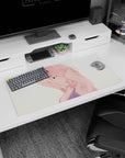 Modern 32x16 inches mouse pad featuring Zero Two in golden light, with soft pink hair and cyan eyes capturing her allure and confidence.