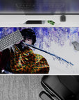 Elegant 40x20 inch anime desk pad showcasing Giyu Tomioka's calm resolve and powerful sword technique