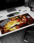 Anime girl mid-turn with dual pistols on desk pad 40x20 inches, chestnut hair and blue bows.
