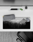 Serene 28x12 mouse pad featuring a monochrome wilderness scene in gray tones, adding a tranquil touch to your desk