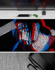 40x20 inches anime desk pad in moody black with trippy red and blue genjutsu-style double image.