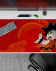 Dynamic 40x20 inch anime desk pad showcasing young Saiyan charm and classic Dragon Ball nostalgia