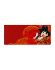 28x12 inch mouse pad featuring Kid Goku on bold red background with nostalgic dragon motif details