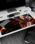 40x20 inches One Punch Man desk pad showing Saitama staring calmly as his cape whips amid burning embers.