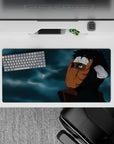 32x16 inches dark anime mouse pad in black and warm orange tones with moody blue-gray clouds.