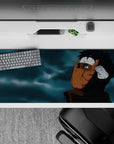 36x16 inches extended mouse pad in dark, moody blues and sharp blacks with warm orange mask tones.