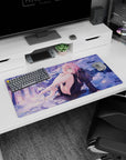 Winter dreamscape 32x16 mouse pad with Zero Two, showcasing a serene snowy backdrop and soft purples contrasted by a golden sunset for elegance and playfulness