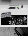 Anime mouse pad featuring chibi characters from Demon Slayer, size 32x12 inches, with bold black-and-white contrasts.