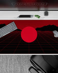 Futuristic 40x20 desk pad showcases distant mountains and bold red hues for immersive workspace decor