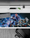 Anime desk pad 36x16 inches featuring Kirito and Asuna in neon tones against a cyber-city background for upgraded style.
