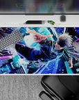 40x20 inches desk pad showcasing Satoru Gojo soaring through the cityscape, with vibrant blues and purples emphasizing his unstoppable power.
