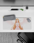 Asuna anime mouse pad, 28x12 inches, features her glowing in angelic whites and pinks with feathers, creating a magical aura.