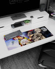 32x12 inches anime mouse pad with white-haired amber-eyed girl before two back-to-back rivals.