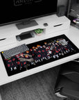 Pain leads the Akatsuki squad photo scene on anime desk pad 36x16 inches, cloaks and red clouds.