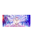 Mouse pad featuring Goku in Mastered Ultra Instinct, 28x12 inches, capturing his calm yet powerful stance surrounded by vibrant energy.