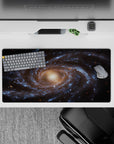 Large 32x16 inch mouse pad featuring a calming spiral galaxy design with smoky blues, golden tones, and starry details.