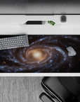 Galaxy themed desk pad 36x16 inches with deep blue and golden tones, smooth surface for work and gaming.