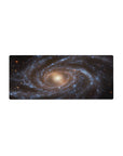 Spiral galaxy design mouse pad 28x12 inches with cosmic blues, gold core, and smooth surface for work or gaming.