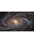 Desk pad 40x20 inches featuring a spiral galaxy design with smoky blues, golden core, and starry details.