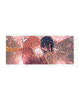 Anime mouse pad 28x12 inches featuring blush-pink petals, kimono details, and sakura lights in a peach sky.