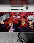 Iconic 40x20 desk pad showcasing Jujutsu Kaisen sorcerers in action for fans of supernatural battles