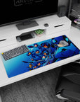 36x16 inches anime desk pad showing Mega Man leading a helmeted team, action poses like a speed snapshot.