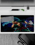32x16 inches mouse pad with Zoro from One Piece, showcasing his legendary swordsmanship in a fierce battle stance alongside a blue dragon.