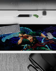 36x16 inches desk pad with Zoro from One Piece, showcasing his fierce swordsmanship and determination alongside a powerful blue dragon.