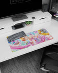 28x12 inches desk mouse pad showing wide-eyed orange-haired idol in a candy-glass ballroom with sweets.