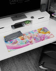 32x12 inches mouse pad showing wide-eyed orange-haired anime idol in a candy-glass ballroom with floating treats.
