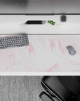 Pastel pink monochrome anime desk pad 36x16 inches, bubbly cute vibe with blush dots and cheerful smile.
