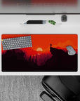 32x16 inches mouse pad with sunset design, featuring intense orange skies and dark mountain silhouettes for an adventurous workspace vibe.