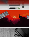 40x20 inches mouse pad with dramatic sunset, featuring orange skies and dark mountain silhouettes for adventurous, bold workspace vibes.
