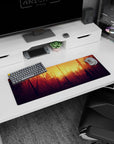 Artistic 32x12 inches mouse pad featuring a sunset forest with warm oranges and golds for a glowing, inspiring design.