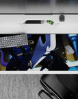 Anime desk pad 36x16 inches featuring Kirito's intense battle with Minotaur boss; vivid blues and indigos dominate.