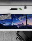 36x16 inches anime desk pad in cobalt-to-peach sunset gradients, calm cinematic vibe, easy on eyes.
