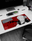 Eerie black ink splatters on 32x16 Sukuna mouse pad for fans of Jujutsu Kaisen's sinister side