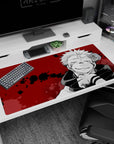 Blood-red Sukuna design on 40x20 Jujutsu Kaisen desk pad with black ink splatters for fans of dark aesthetics