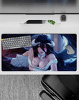 Albedo from Overlord anime mouse pad, 32x16 inches, showcasing her allure with shimmering eyes and striking wings against a vivid backdrop.