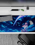 Romantic 36x16 desk pad featuring Zero Two in a starry sky with deep blues and soft pinks, capturing the elegance and beauty of Darling in the Franxx