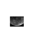 Classic 14x10 inches mouse pad with a giant moon and speckled stars over deep black space.