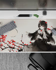 Moody ink-wash gray anime desk pad 40x20 inches with raven hair and crimson blossoms, midnight vibe.