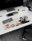Red-eyed raven-haired anime girl in frilly black lace beneath rose branches mouse pad 32x12 inches.