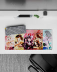 28x12 inches pastel anime desk mat in yellow, pink, and cool blue, bright loud playful stage vibe.