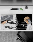 Black-and-white 32x16 inches anime mouse pad with high-contrast ink brush textures, tense vibe.