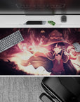 Megumin from KonoSuba unleashing an explosion, dark skies, and glowing embers on a 40x20 inch anime desk pad.